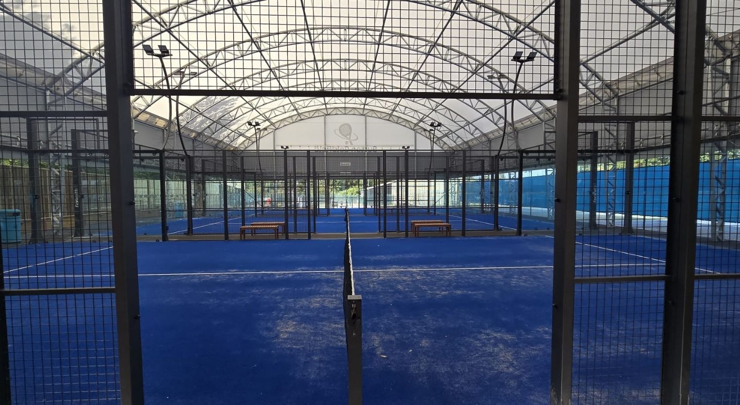 New padel courts showing Our three new covered padel courts are now available to book